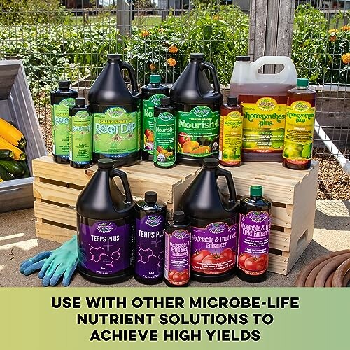 Various garden nutrient solutions displayed on wooden crates.