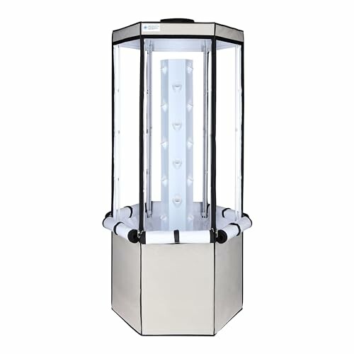 Hydroponic growing tower with vertical design and LED lights.