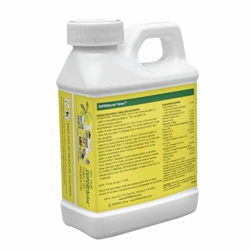 Bottle of plant nutrient solution with yellow label.